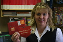 Andrea Holátková, Postmistress
